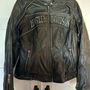 Women’s large reflective Harley-Davidson Black Leather Riding Jacket. Used once